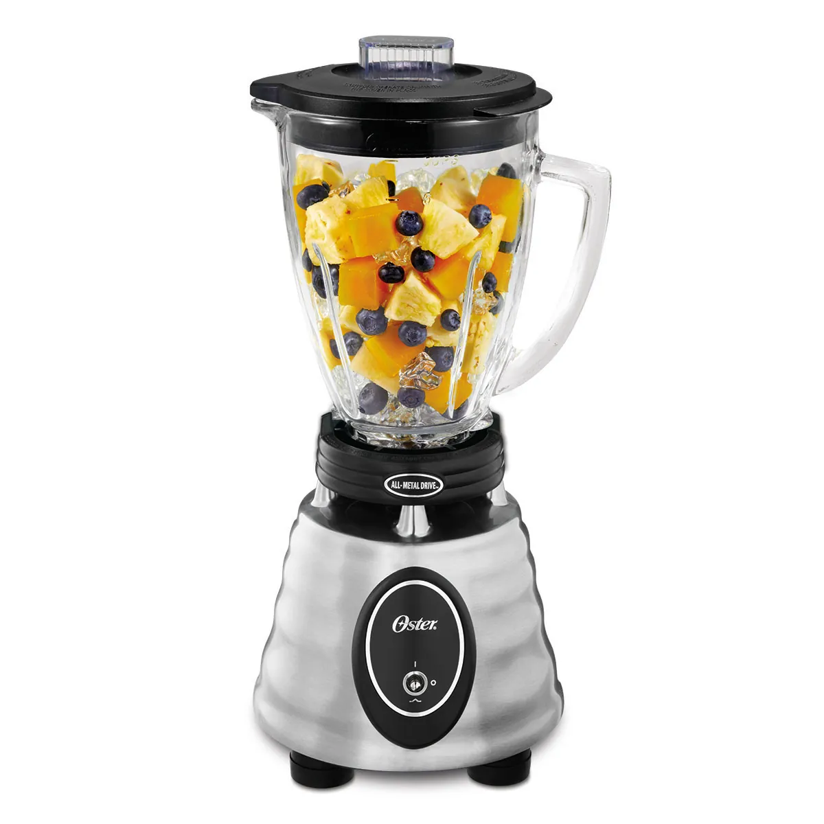 Affordable Oster blender blending a strawberry smoothie on a kitchen counter