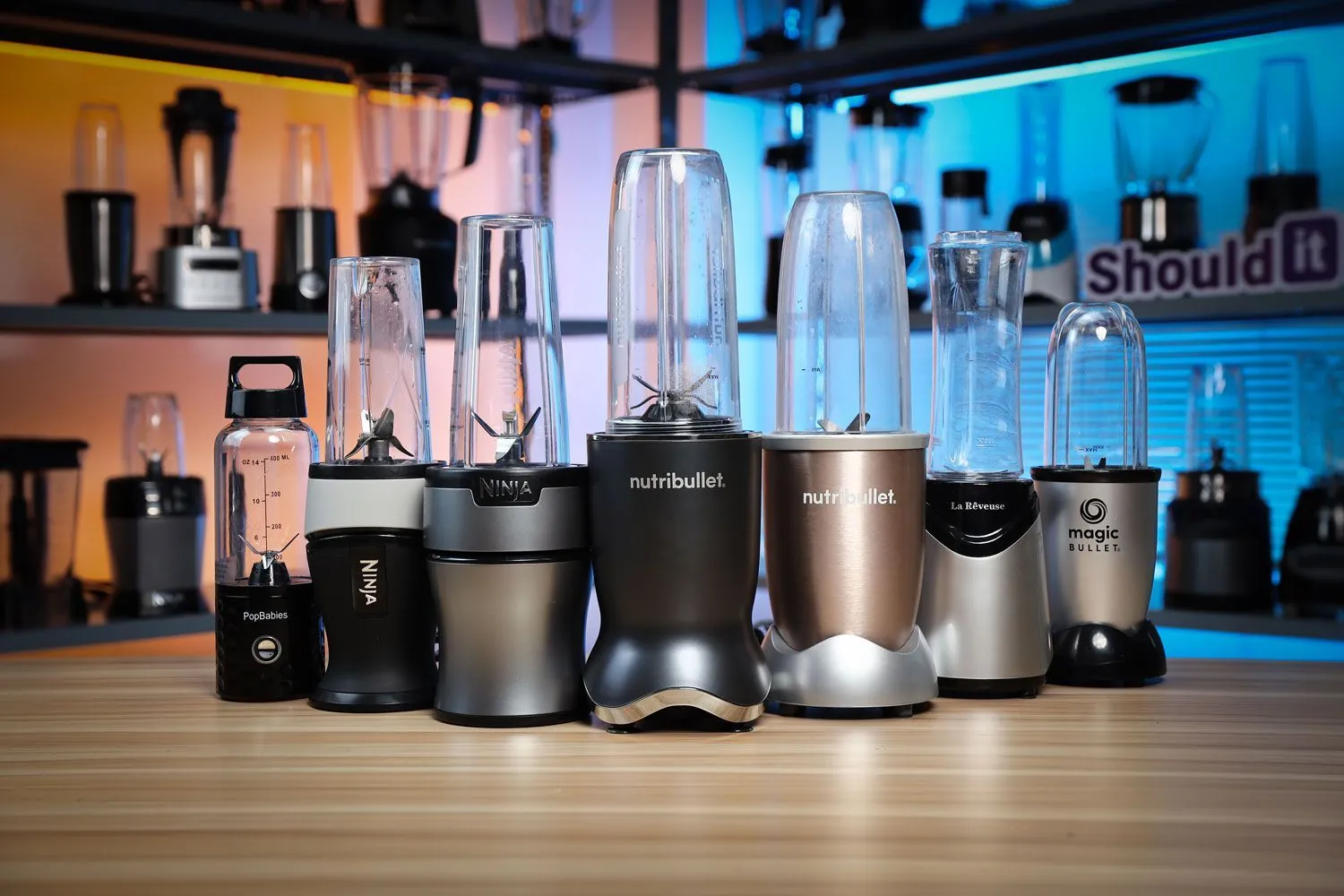 Blender pitcher filled with layered ingredients ready to blend