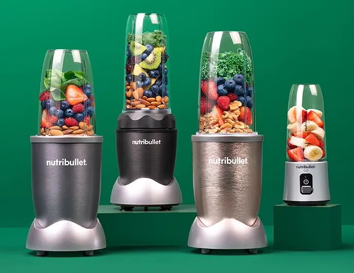 Bullet blender cup drying upside down beside its blade assembly