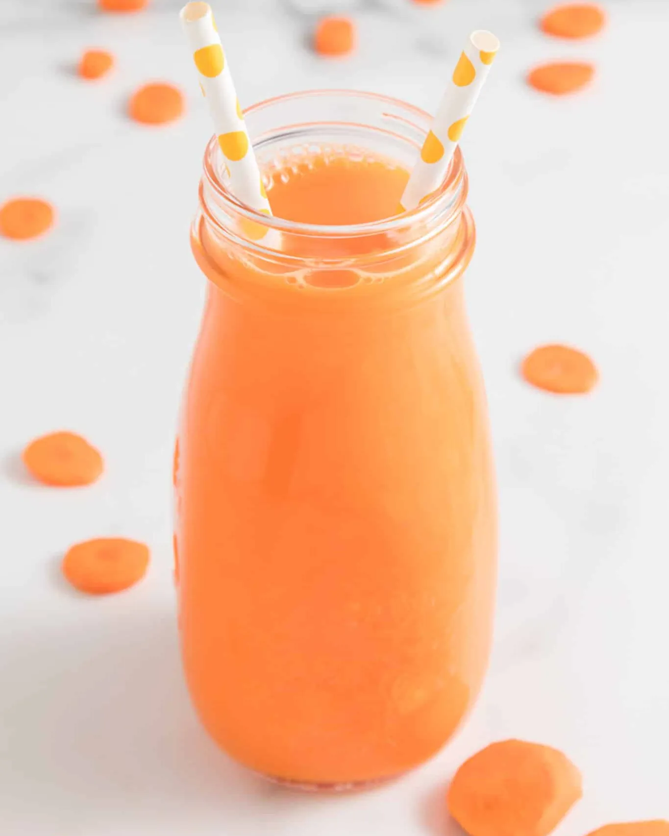 Centrifugal and masticating juicers displayed on a kitchen counter