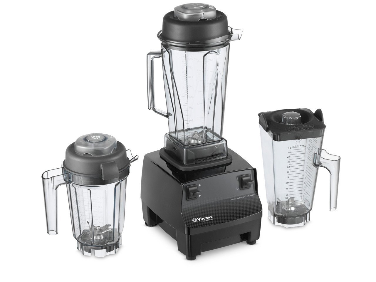 A clear Vitamix 40 ounce blender container sits on a bright marble kitchen counter.