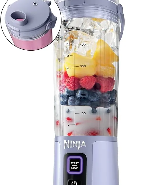 Close up of the integrated blade assembly inside a portable Ninja Blast blender base.