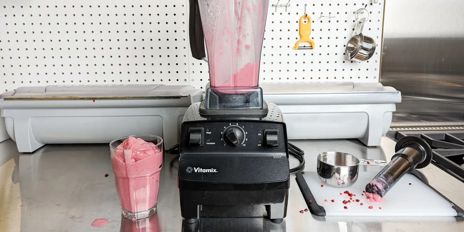 Cracked Vitamix pitcher on a counter, showing damage that needs professional repair