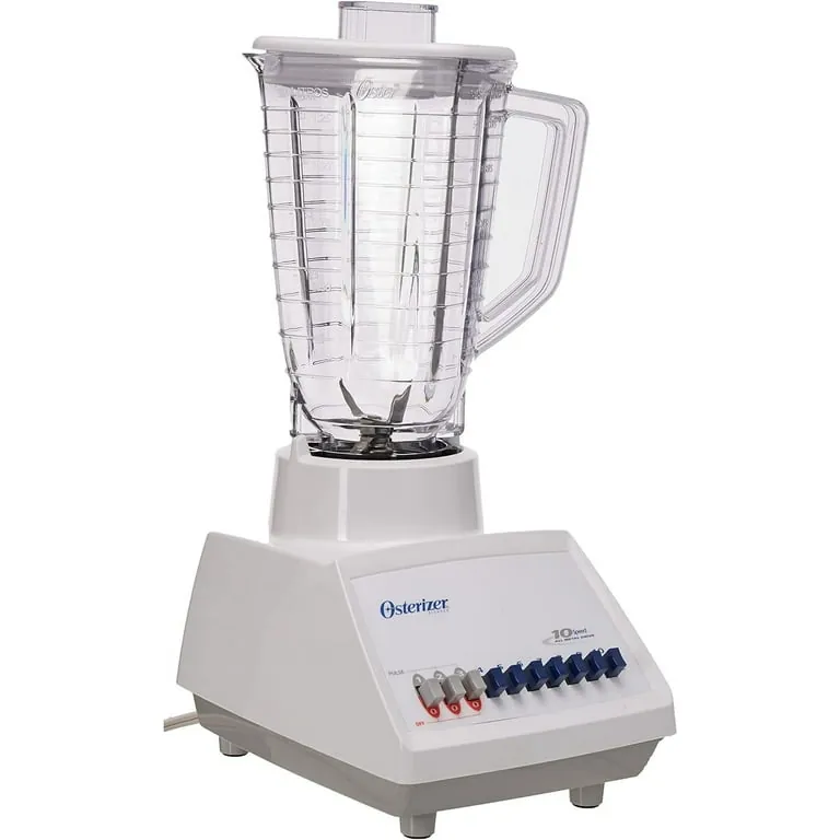 Four Oster blender jar styles lined up on a wooden kitchen table