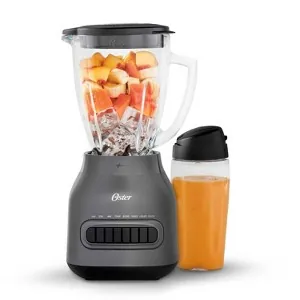 Glass and plastic Oster blender jars on the dishwasher top rack