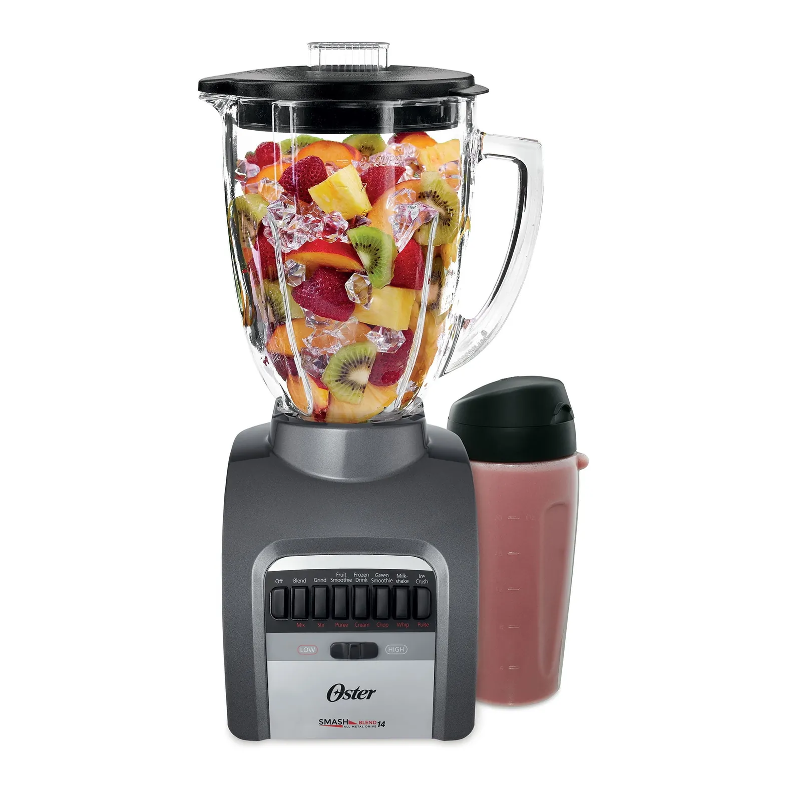 Hand selecting speed on Oster 14-speed blender with green smoothie