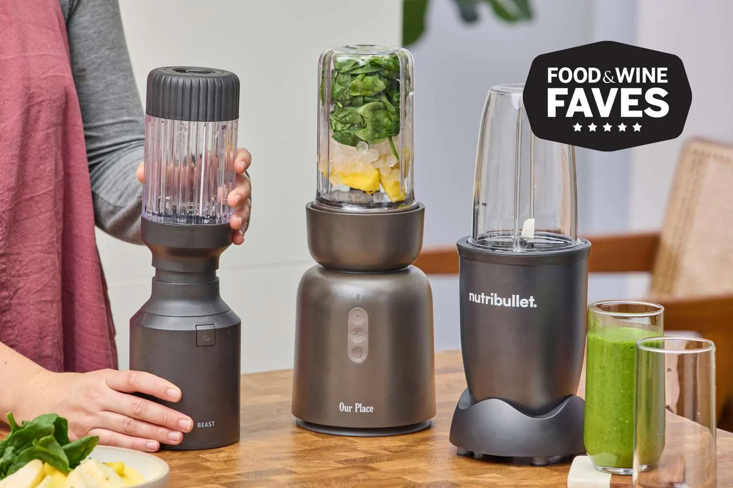 Hands comparing a cloudy blender jar with a replacement jar on a counter
