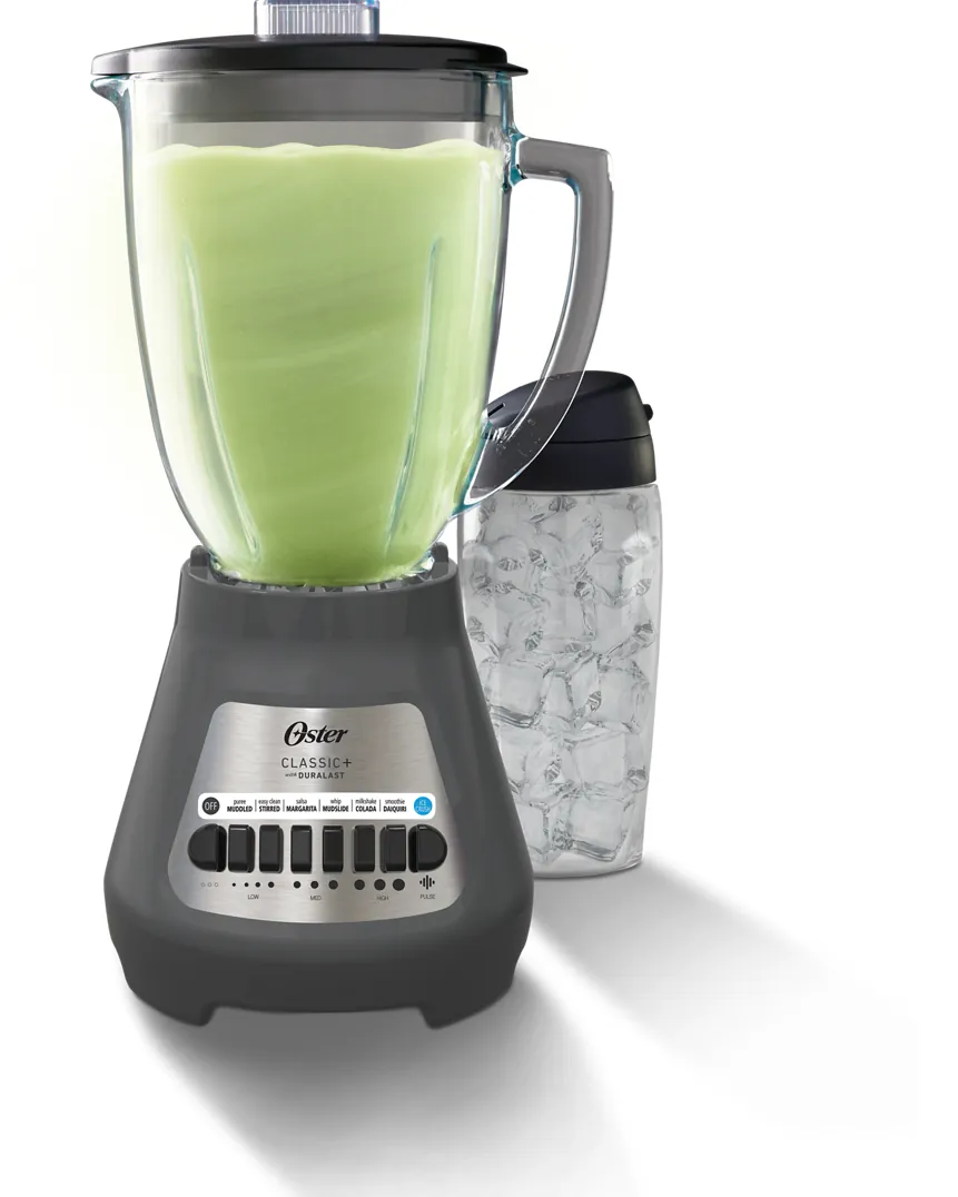 Hands reseating a blender jar onto its base with new coupling nearby