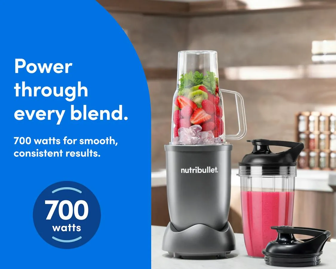 Hard ingredients like nuts, coffee beans and ice cubes beside a blender cup