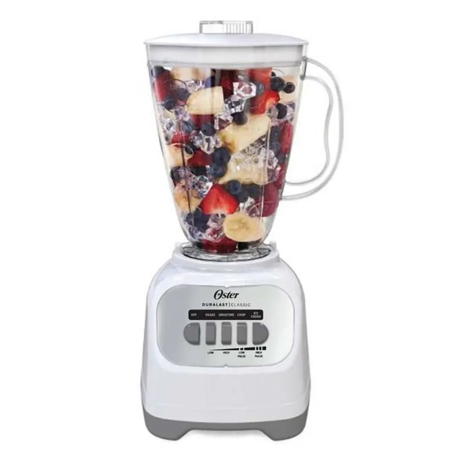 Hot soup pot next to Oster Duralast blender and immersion blender