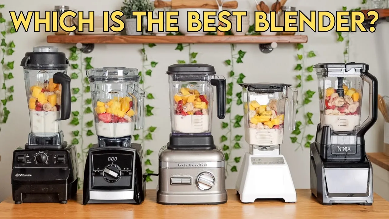 An industrial-grade commercial blender with a sound shield sits on a busy cafe counter.