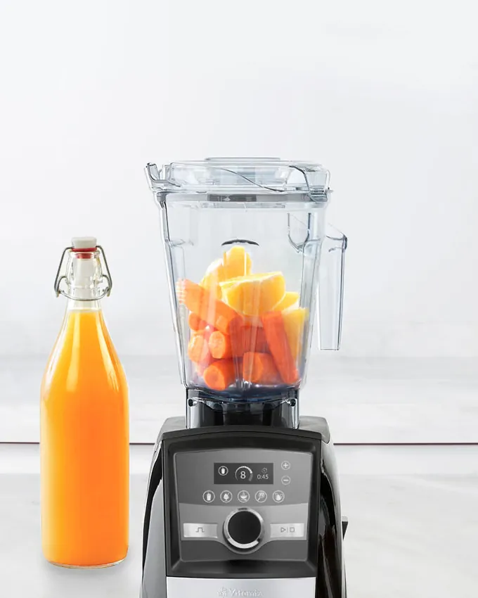 Industrial juicing press in a warehouse showing why manual methods are too slow for business.