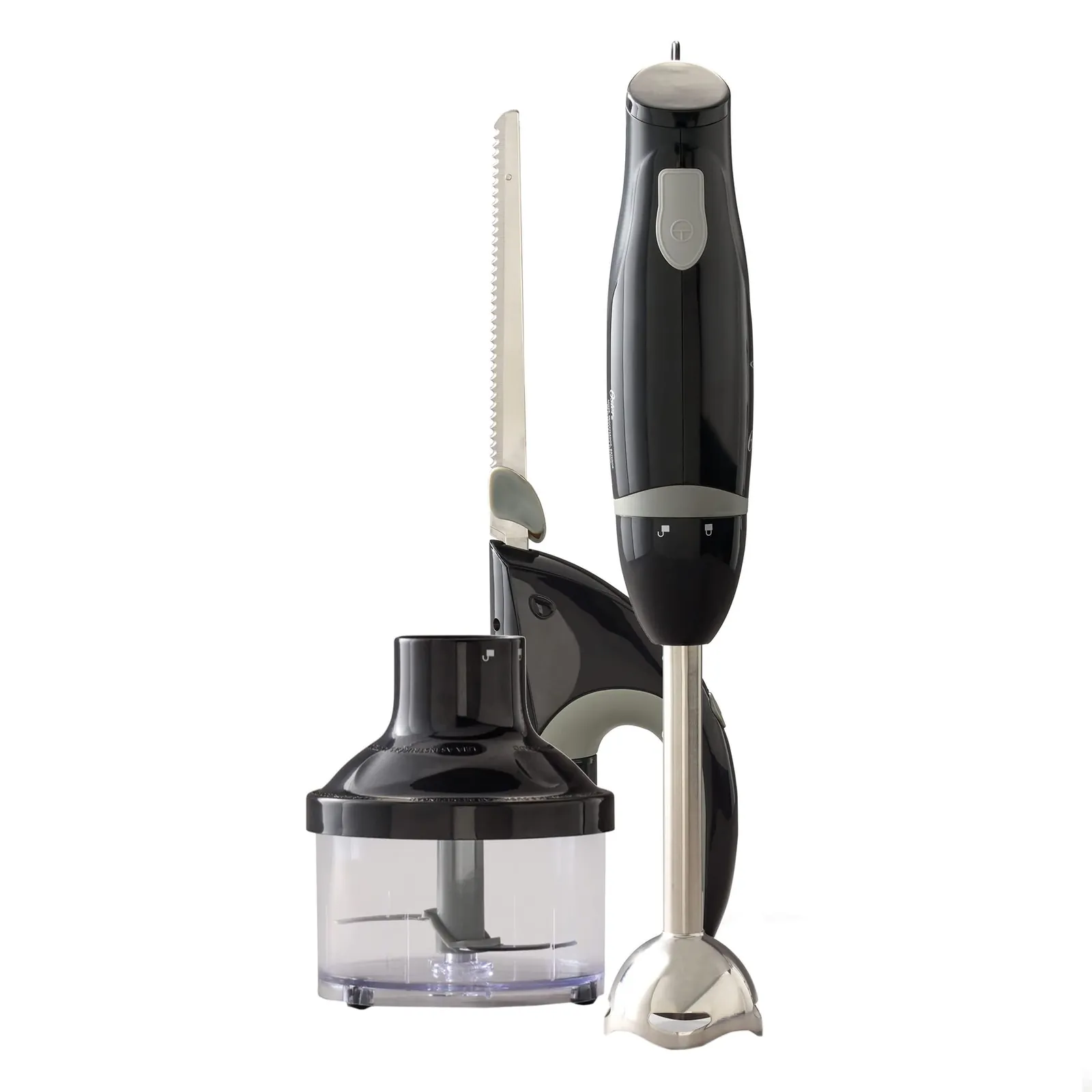 New Oster hand blender parts unboxed on a kitchen counter