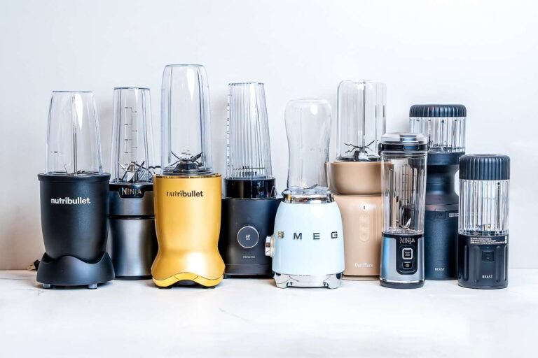 Ninja and Nutribullet blenders side by side on a kitchen counter