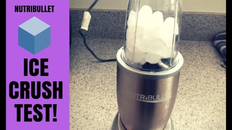 Nutribullet blender with ice and water on a kitchen counter