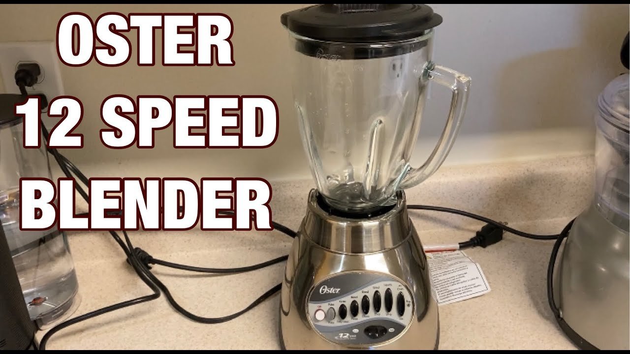 Oster 12 speed blender with glass jar on a clean kitchen counter