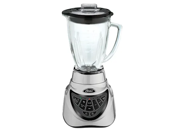 Oster blender base with warranty card and screwdriver on table