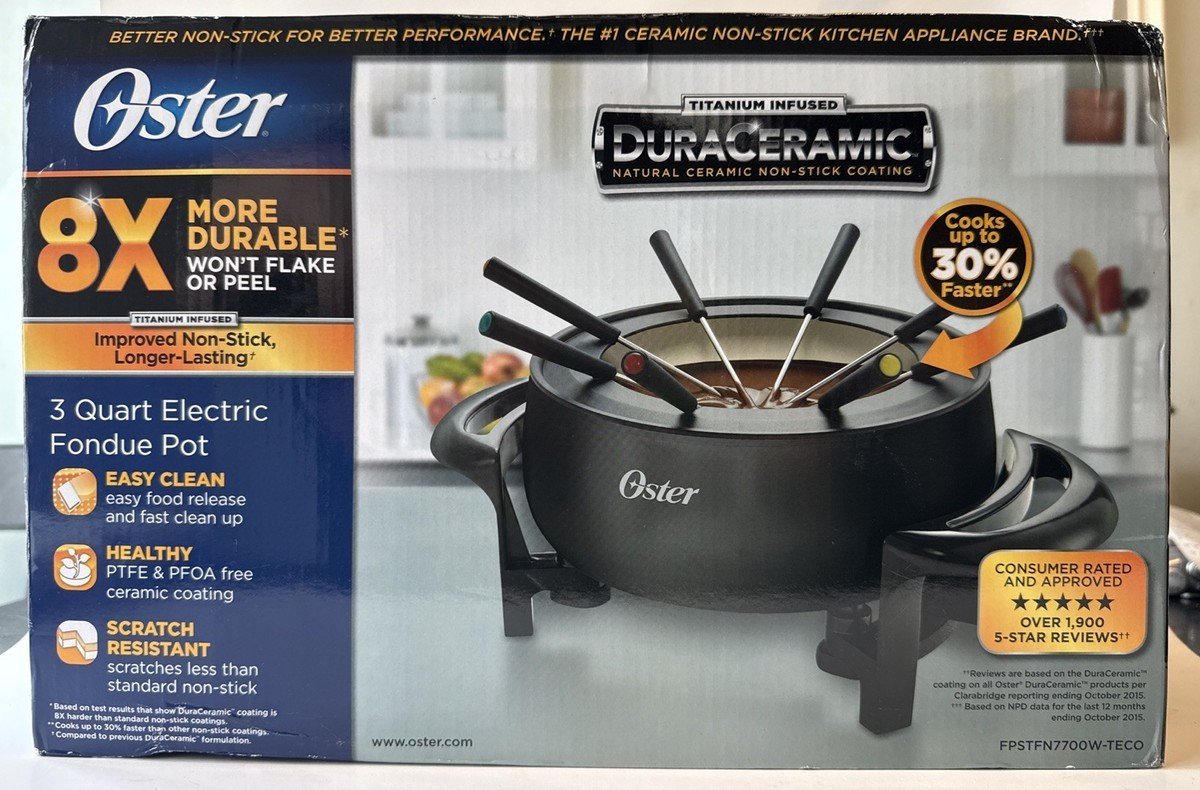 Oster kitchen appliances and a hair clipper arranged on a sunlit countertop