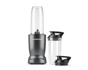 Personal blender and dates on a kitchen counter ready for blending