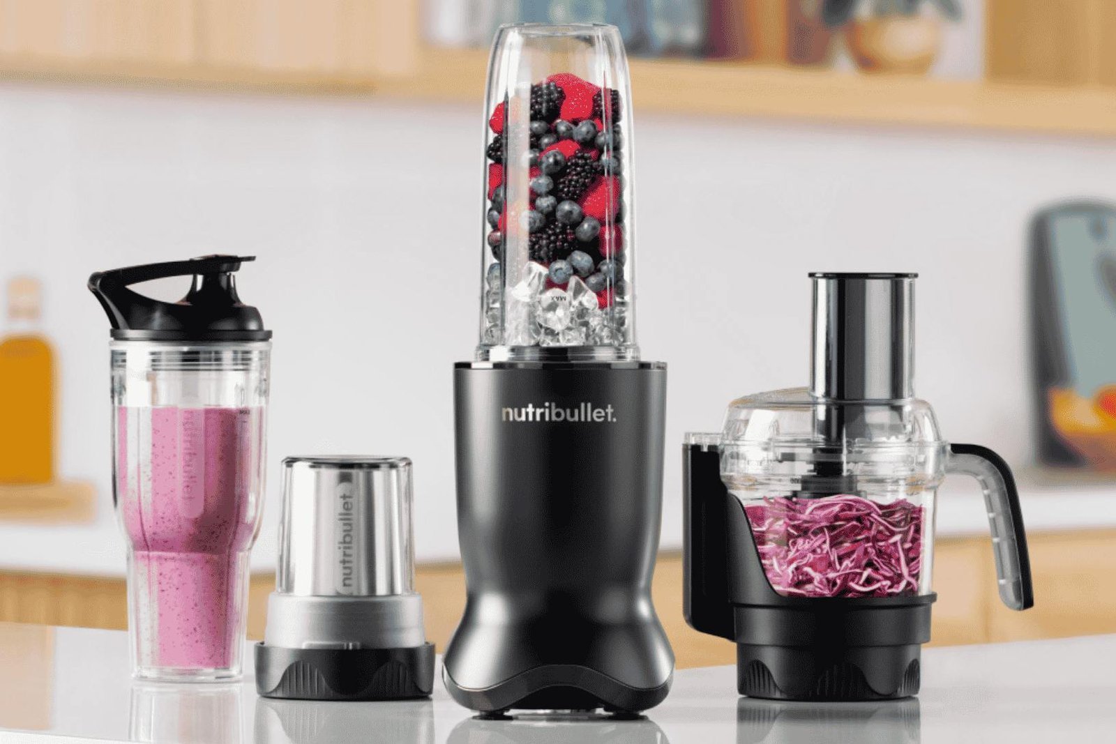 Personal blender with fruit smoothie on a bright kitchen counter