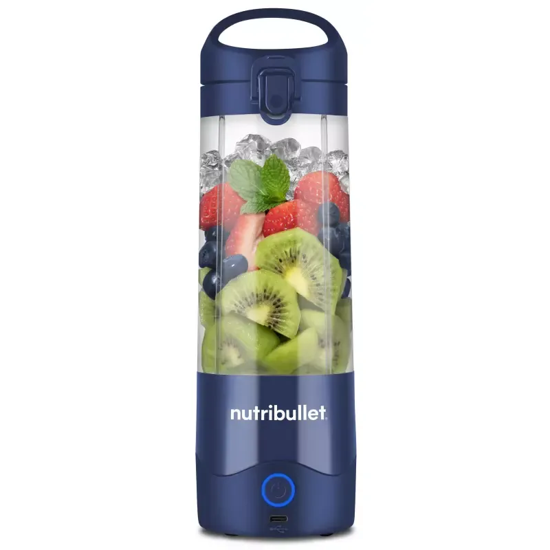 Portable blender charging on a counter with cable attached