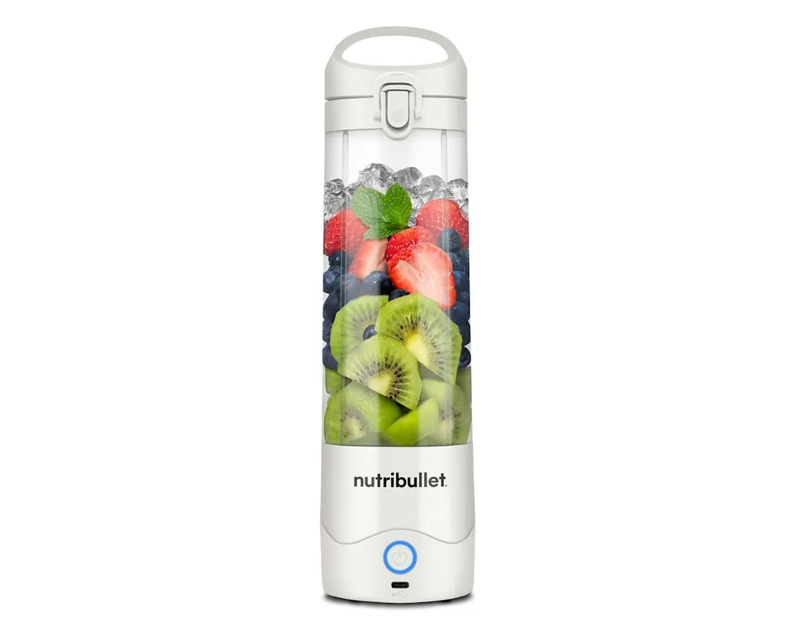 Portable blender with glowing indicator light beside cable and open box