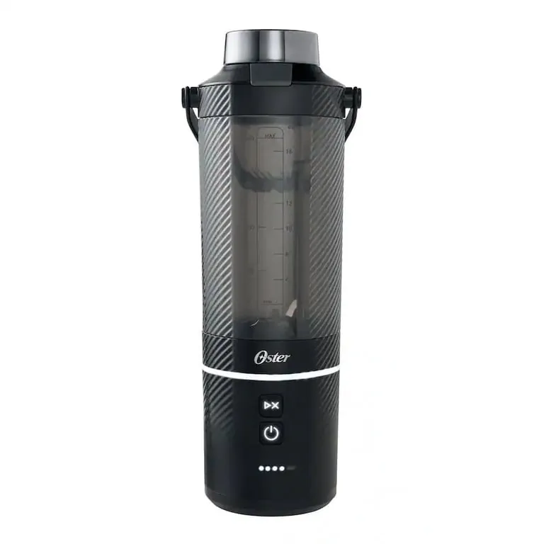 Portable blender with ice cubes next to a countertop blender