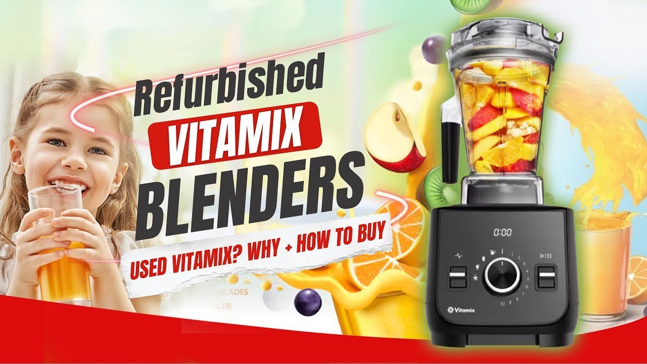 A professional Vitamix blender sits on a marble countertop in a bright modern kitchen.