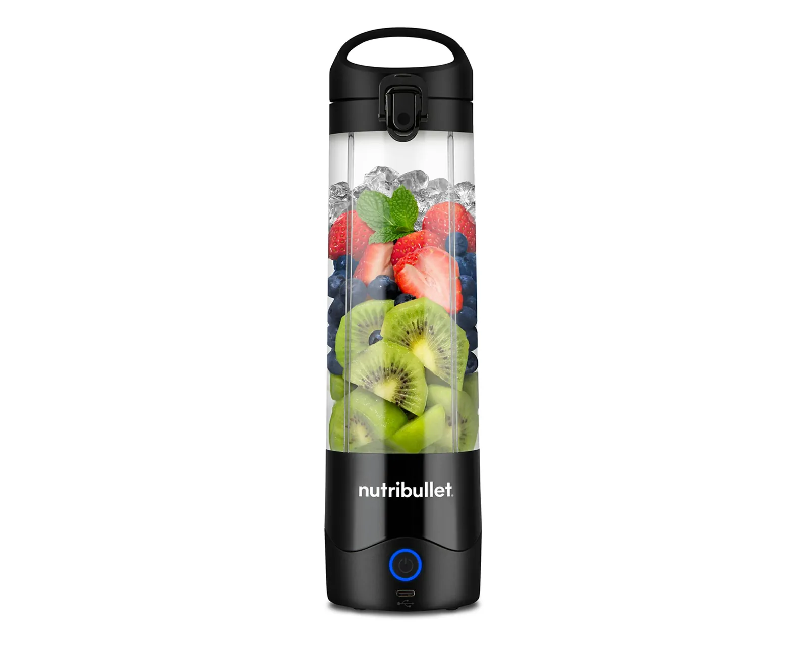 Single-serve portable blender with green smoothie ingredients on counter