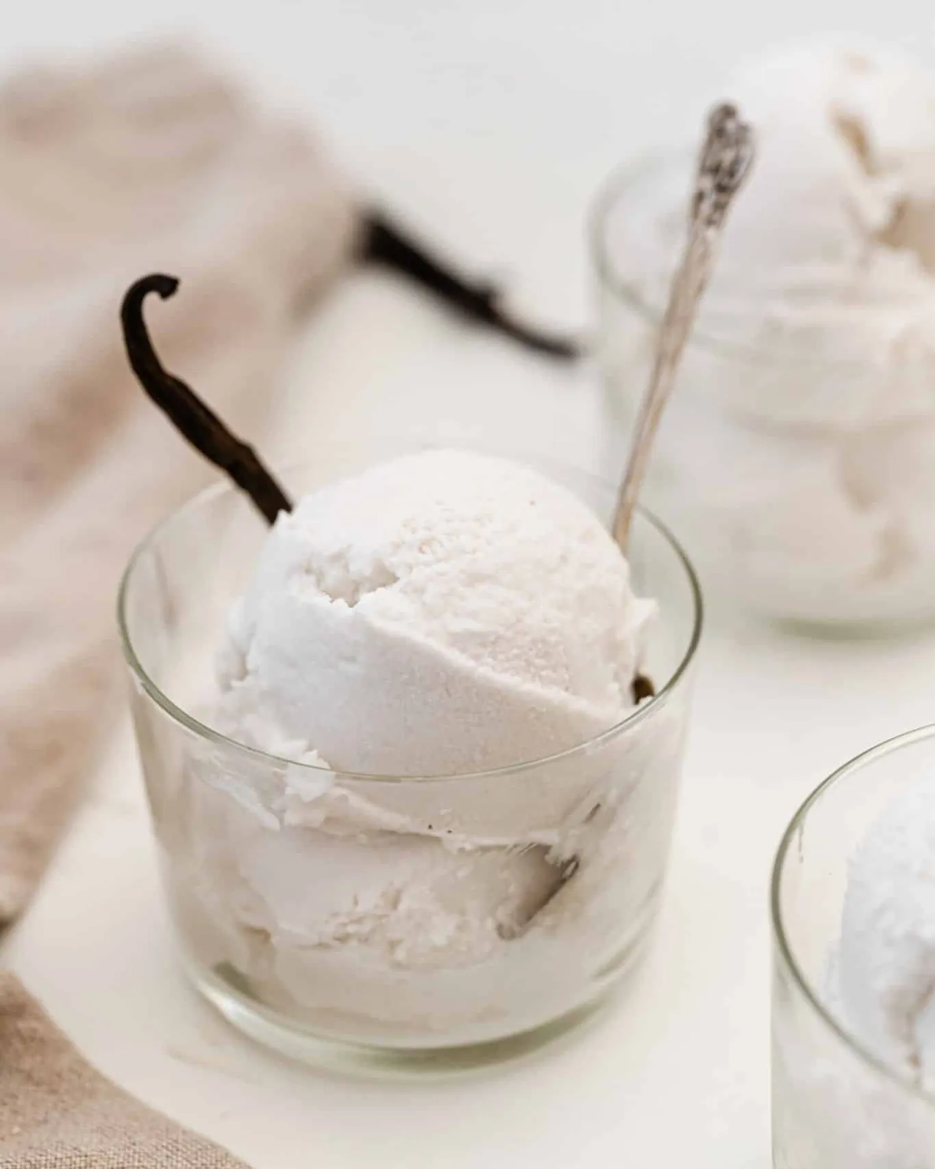 Thermometer next to chilled cream bowl showing temperature check