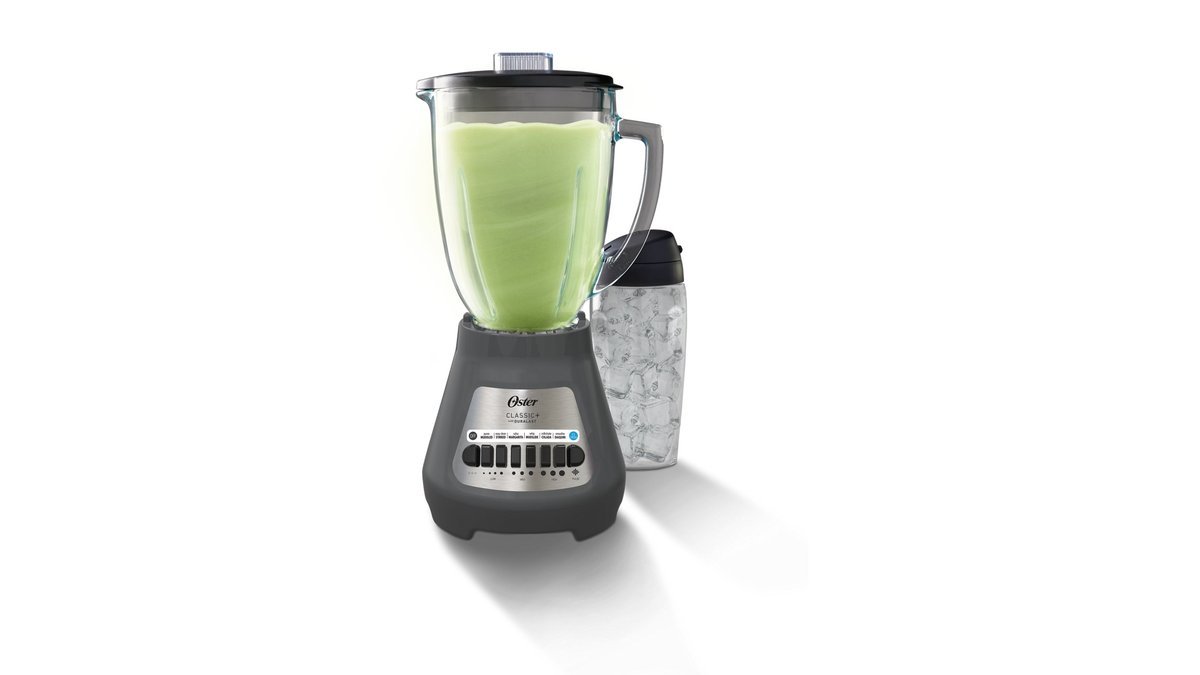 Three Oster blenders of different sizes lined up on a kitchen counter