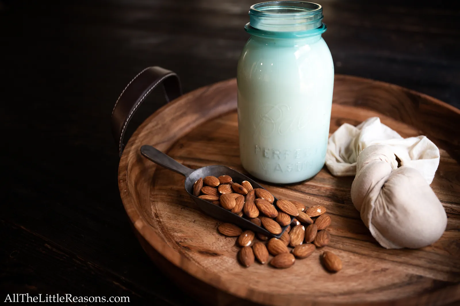 Two glasses showing different ratios of creamy versus thin homemade almond milk