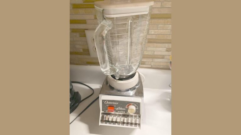 Vintage chrome Osterizer blender beside a modern blender on a kitchen counter