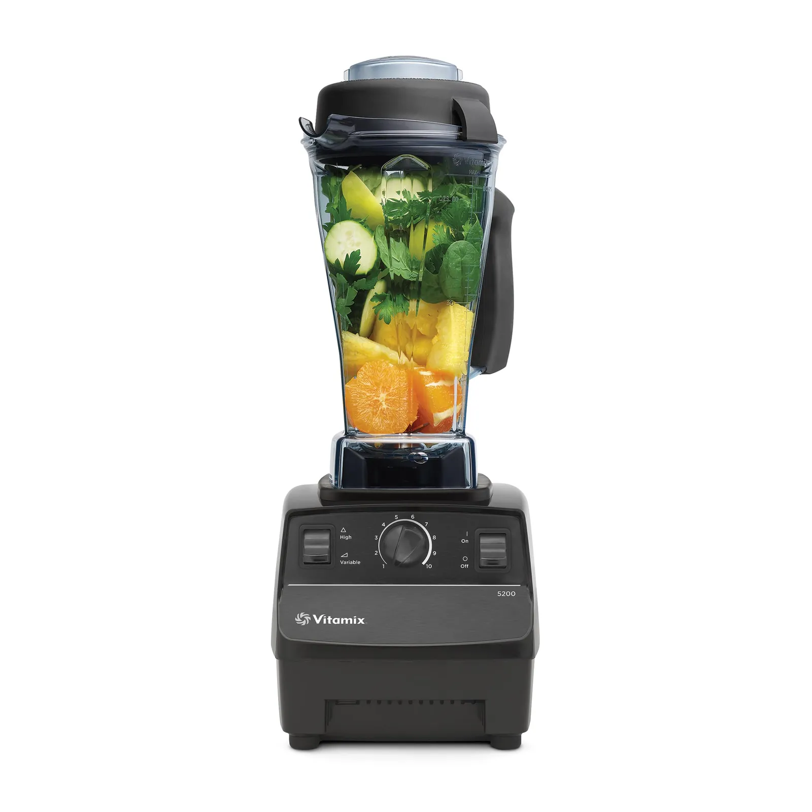 A Vitamix Explorian E310 and a Ninja blender on an oak counter beside spinach and smoothie in soft natural light.
