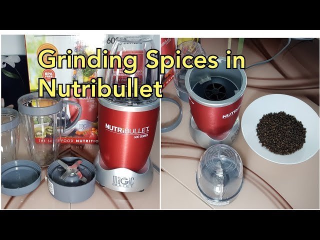 Whole spices and a personal blender on a kitchen counter ready for blending